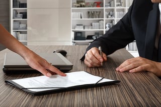 Estate planning documents being signed