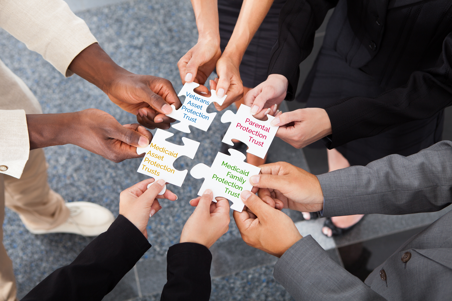 4-Different-Types--Close-up-Photo-Of-Businesspeople-Holding-Jigsaw-Puzzle